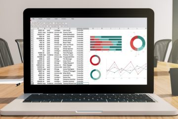 Laptop on a conference room desk. Using Google Sheets for business purposes