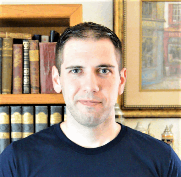 A photo of Corey Bustos, who created the website SpreadsheetClass.com