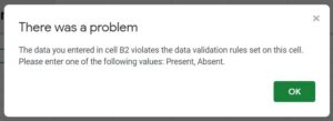 Example of "There was a problem" message in Google Sheets when invalid data is entered into a cell with data validation, when reject input is selected