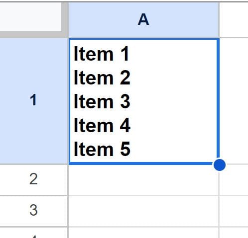 Example of wrapping text manually by inserting a new line inside the cell in Google Sheets